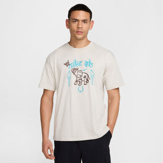 Nike SB Elephant M90 Skate Tee with roomy fit, dropped shoulders, and soft midweight cotton.