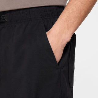 Nike SB Dri-FIT Kearny Cargo Skate Shorts in Black with sweat-wicking fabric and secure pockets.