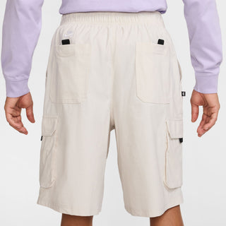 Nike SB Dri-FIT Kearny Cargo Skate Shorts in Light Bone with sweat-wicking fabric and secure pockets.