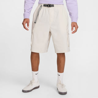 Nike SB Dri-FIT Kearny Cargo Skate Shorts in Light Bone with sweat-wicking fabric and secure pockets.