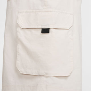 Nike SB Dri-FIT Kearny Cargo Skate Shorts in Light Bone with sweat-wicking fabric and secure pockets.