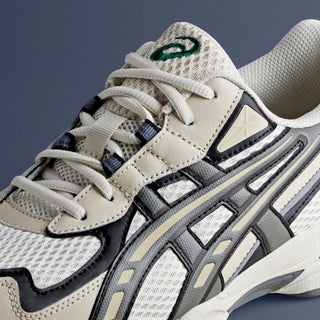 ASICS GEL-NYC 2055 sneaker in Pale Oak/Truffle Grey with GEL® technology and retro design.