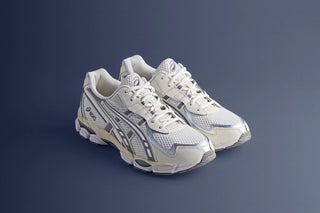 ASICS GEL-NYC 2055 sneaker in Cream/Steeple Grey with GEL® technology and retro design.