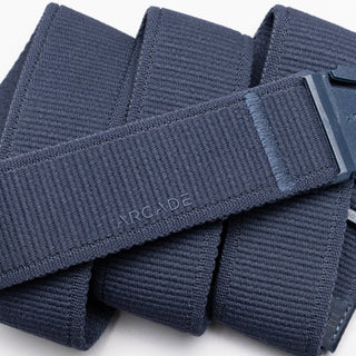 Arcade Atlas Stretch Belt in Navy with patented A2 buckle, performance stretch, and sustainable REPREVE®️ material.