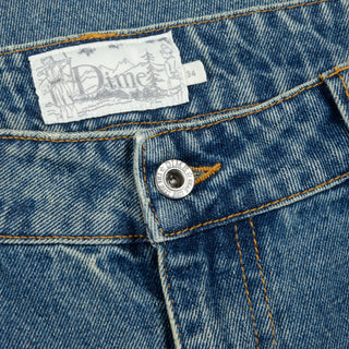 Dime Classic Relaxed Denim Pants in Sandblasted Indigo with wavy patch pockets and embroidered logo.