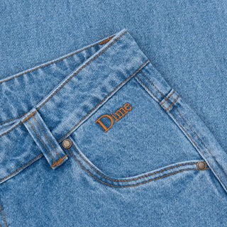 Blue washed relaxed denim pants with front coin pocket and embroidered logo on the back.