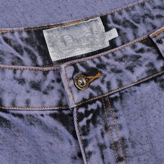 Stone purple relaxed denim pants with logo embroidery and wave patch pockets.