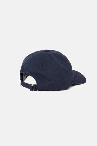 Vintage-style navy cap with sun logo embroidery and adjustable strap.