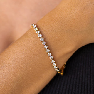 Gold Hemingway bracelet with 18K gold-filled finish, cubic zirconia, fold-over clasp, and hypoallergenic design.