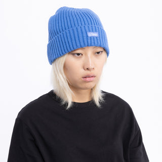 Dime Cursive Fold Beanie in Sky Blue with fold-over design and cursive logo embroidery.