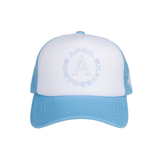 April Full Circle Trucker cap in blue and white with front print and side embroidery.