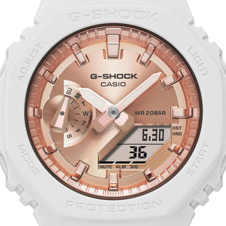 G-SHOCK watch with pink gold dial, minimalist design, and durable resin band.