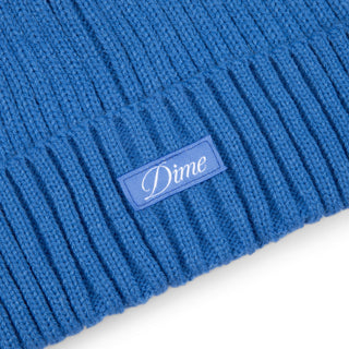 Dime Cursive Fold Beanie in Sky Blue with fold-over design and cursive logo embroidery.