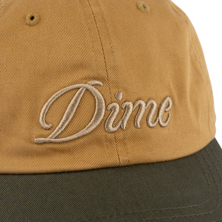 Dime Cursive Low Pro Cap in Wheat Green with strapback and cursive logo.