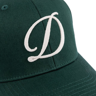 Forest Green strapback cap with chain-stitch embroidery and cotton construction.