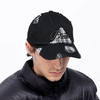 Black strapback cap with minimalist design and cotton construction.