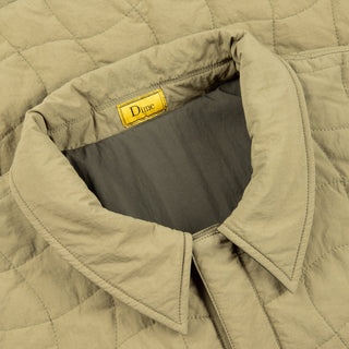 Dime reversible insulated jacket in Moss Army with Loftech insulation and hidden snap closures.