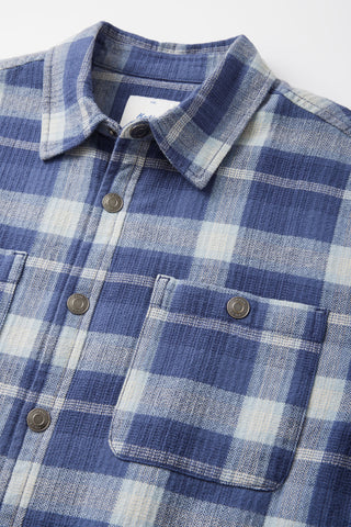 Katin Harold Plaid Jacket in Washed Blue with sherpa liner, cotton flannel, and snap closure.