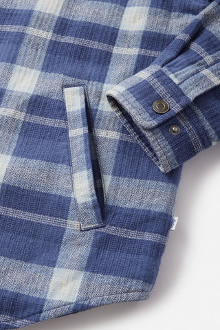 Katin Harold Plaid Jacket in Washed Blue with sherpa liner, cotton flannel, and snap closure.