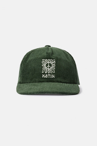 Olive corduroy hat with custom embroidery and adjustable snapback.