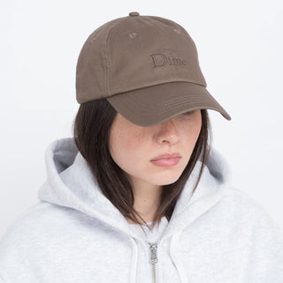 Taupe colored low profile cap made of 100% cotton, designed for style and comfort.