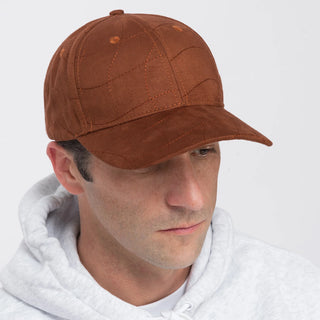 Caramel-colored quilted cap, 100% polyester, full fit design.