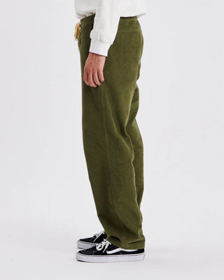 Critical Slide Society Fever Pant in Olive, straight-leg fit with elastic waist, drawcord, and 8 wale cotton corduroy.