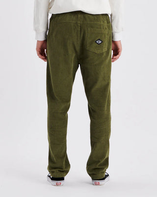 Critical Slide Society Fever Pant in Olive, straight-leg fit with elastic waist, drawcord, and 8 wale cotton corduroy.