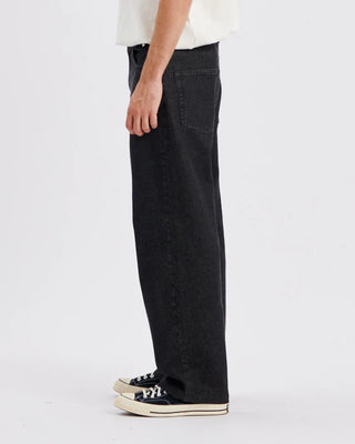 Black denim carpenter-style pant with straight leg and full-length fit.