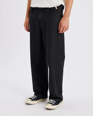 Black denim carpenter-style pant with straight leg and full-length fit.