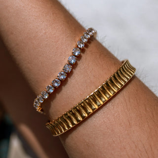 Gold Hemingway bracelet with 18K gold-filled finish, cubic zirconia, fold-over clasp, and hypoallergenic design.