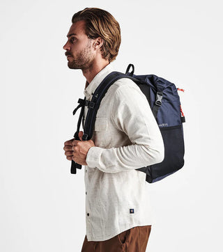 Roark Passenger 27L 2.0 Bag - Blue with magnetic roll top.