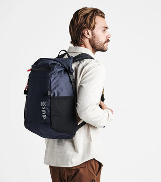 Roark Passenger 27L 2.0 Bag - Blue with magnetic roll top.