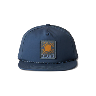 Roark Hybro Strapback Hat in Orion, 5-panel unstructured, hybrid 4-way stretch fabric, crushable visor, bungee closure.