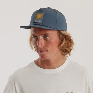 Roark Hybro Strapback Hat in Orion, 5-panel unstructured, hybrid 4-way stretch fabric, crushable visor, bungee closure.