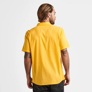 Gold Roark Bless Up Breathable Stretch Shirt with short sleeves.