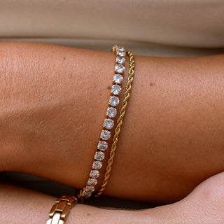 Gold Hemingway bracelet with 18K gold-filled finish, cubic zirconia, fold-over clasp, and hypoallergenic design.