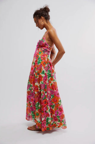 Free People ivory maxi dress with floral design, sweetheart neckline, and open back.