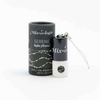 Mixologie Serene light floral mini rollerball perfume keychain.