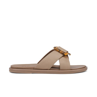 Olukai La'i Slide Women's Sandals in Taupe with tortoise shell buckle.