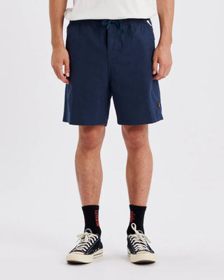 Critical Slide Society Cruiser Linen Short in Blue with a 17" outseam, elastic waist, and linen blend fabric.