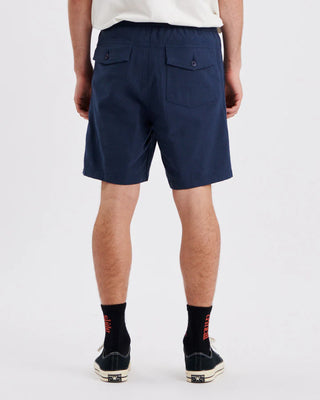 Critical Slide Society Cruiser Linen Short in Blue with a 17" outseam, elastic waist, and linen blend fabric.