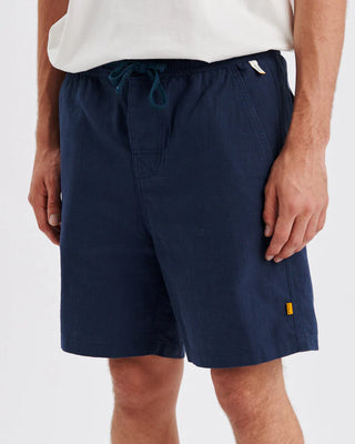 Critical Slide Society Cruiser Linen Short in Blue with a 17" outseam, elastic waist, and linen blend fabric.