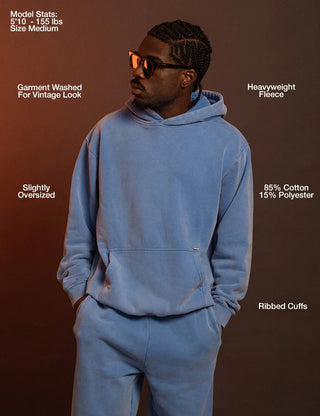 Heavyweight fleece hoodie with relaxed fit and ribbed accents.