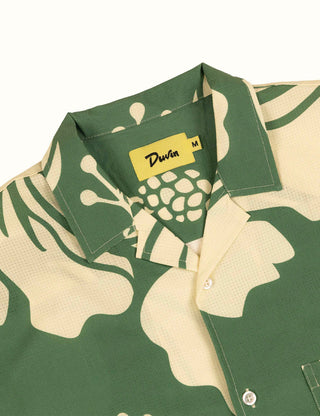 Short sleeve green button-up with relaxed fit and stretch fabric.