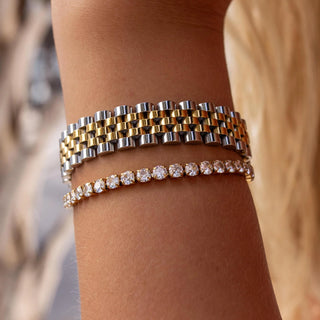 Gold Hemingway bracelet with 18K gold-filled finish, cubic zirconia, fold-over clasp, and hypoallergenic design.