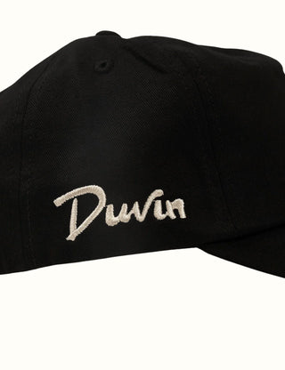 Unstructured cotton twill hat with embroidery and branded details.