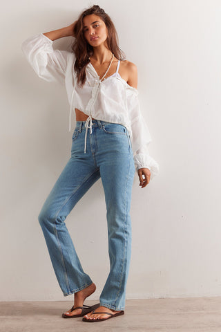 Free People We The Free Xena Slim Straight Jeans, vintage high-rise with slim straight-legs and 5-pocket styling.