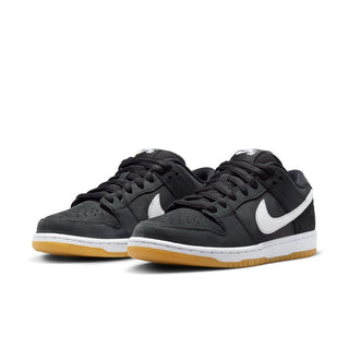 Nike SB Dunk Low Pro in Black/White-Black-Gum Light Brown with nubuck leather and Zoom Air cushioning.