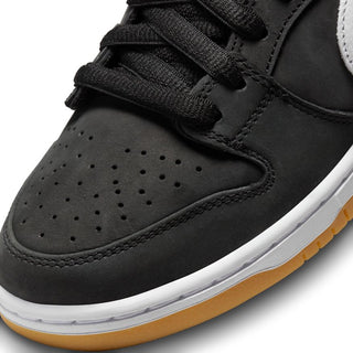 Nike SB Dunk Low Pro in Black/White-Black-Gum Light Brown with nubuck leather and Zoom Air cushioning.